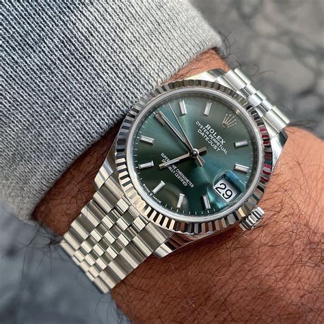 silver rolex with green numbers|rolex 41mm green dial.